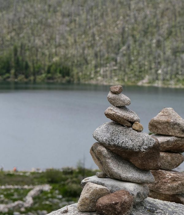 A serene landscape view with balanced stones, symbolizing harmony.
